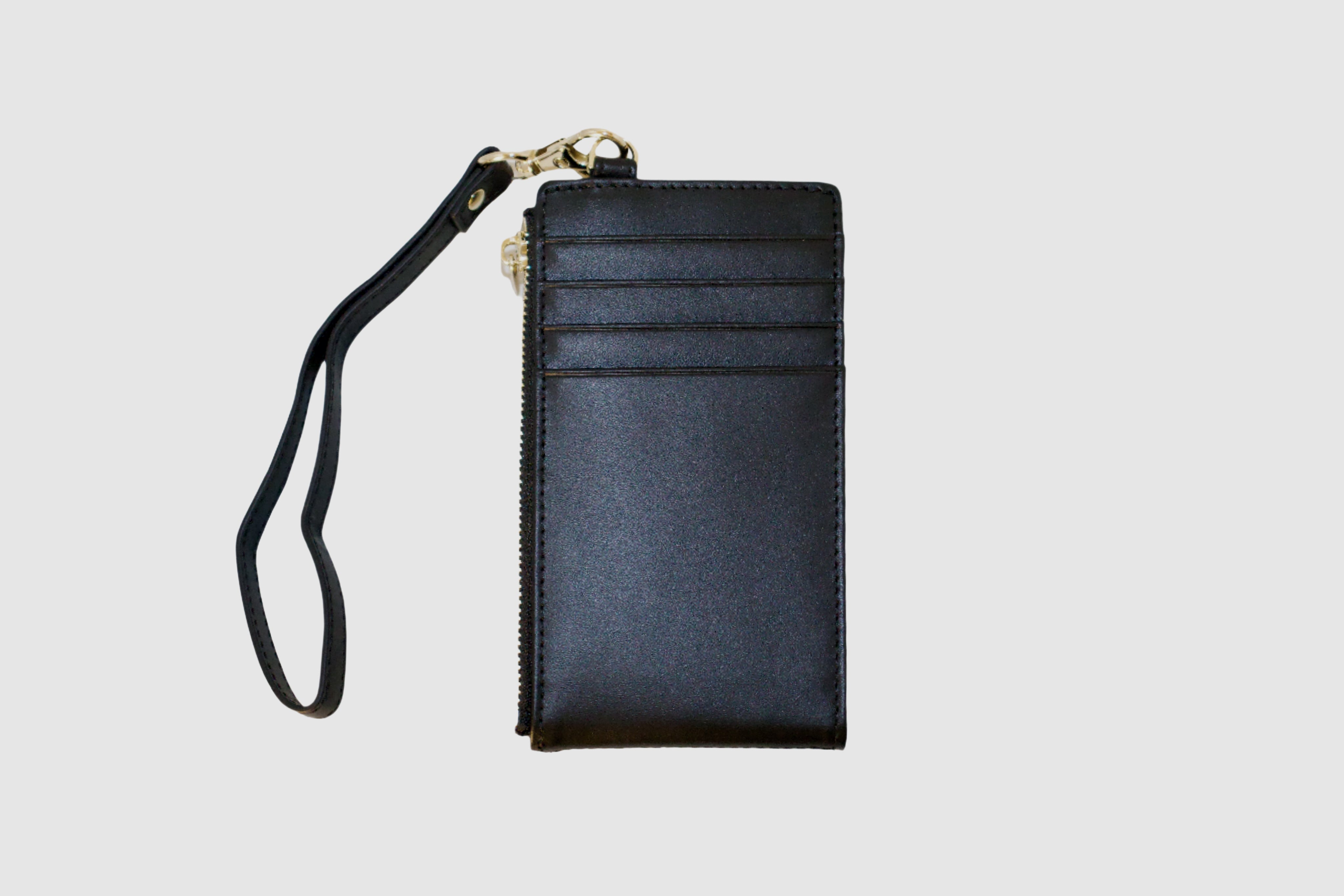 Black wristlet with card slots on a light gray background