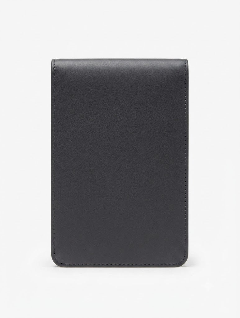 A minimalist black leather sleeve or folio with rounded corners, shown flat against a clean white background.