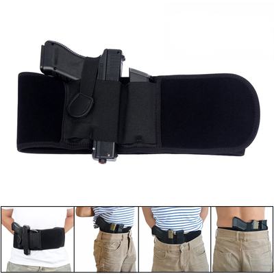 Black belt with gun holster worn by a person on a white background