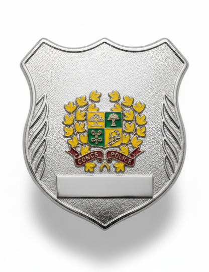Metallic badge with a coat of arms on a white background