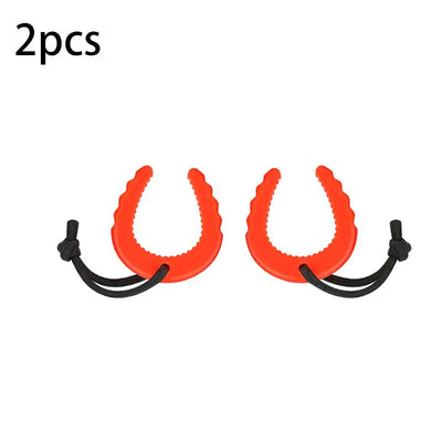 Two red fishing clamps with black straps on a white background
