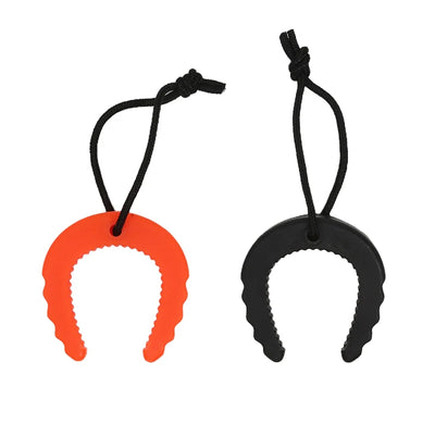 Two silicone lip protectors, one orange and one black, on black strings against a white background.