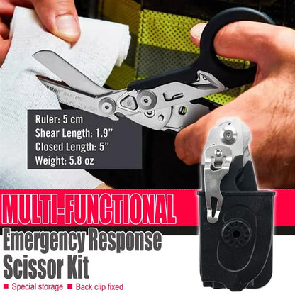 Multi-functional emergency response scissor kit with shears and case, held by a person.