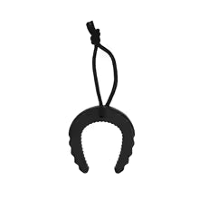Black hair clip with a string on a white background