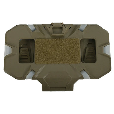 A tactical vest or body armor plate in coyote brown, featuring a central hook-and-loop patch and two side slots, shown against a plain white background.