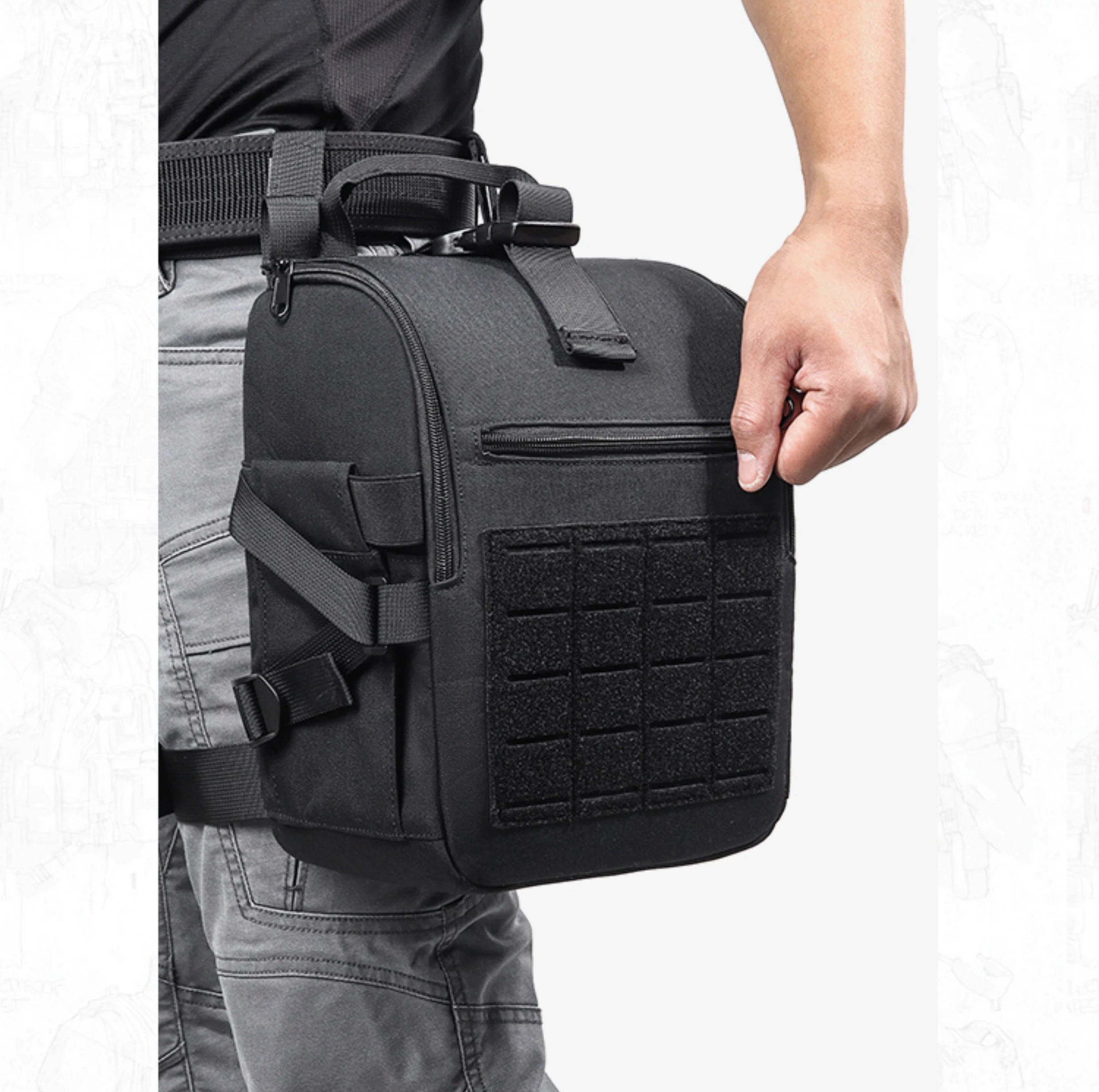 Person holding a black tactical backpack with MOLLE straps on a white background